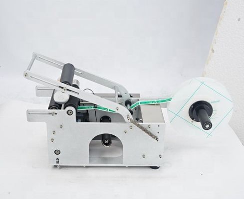 Machine industrielle semi-automatique d'étiquetage des bouteilles pour les bocaux ronds et les canettes
